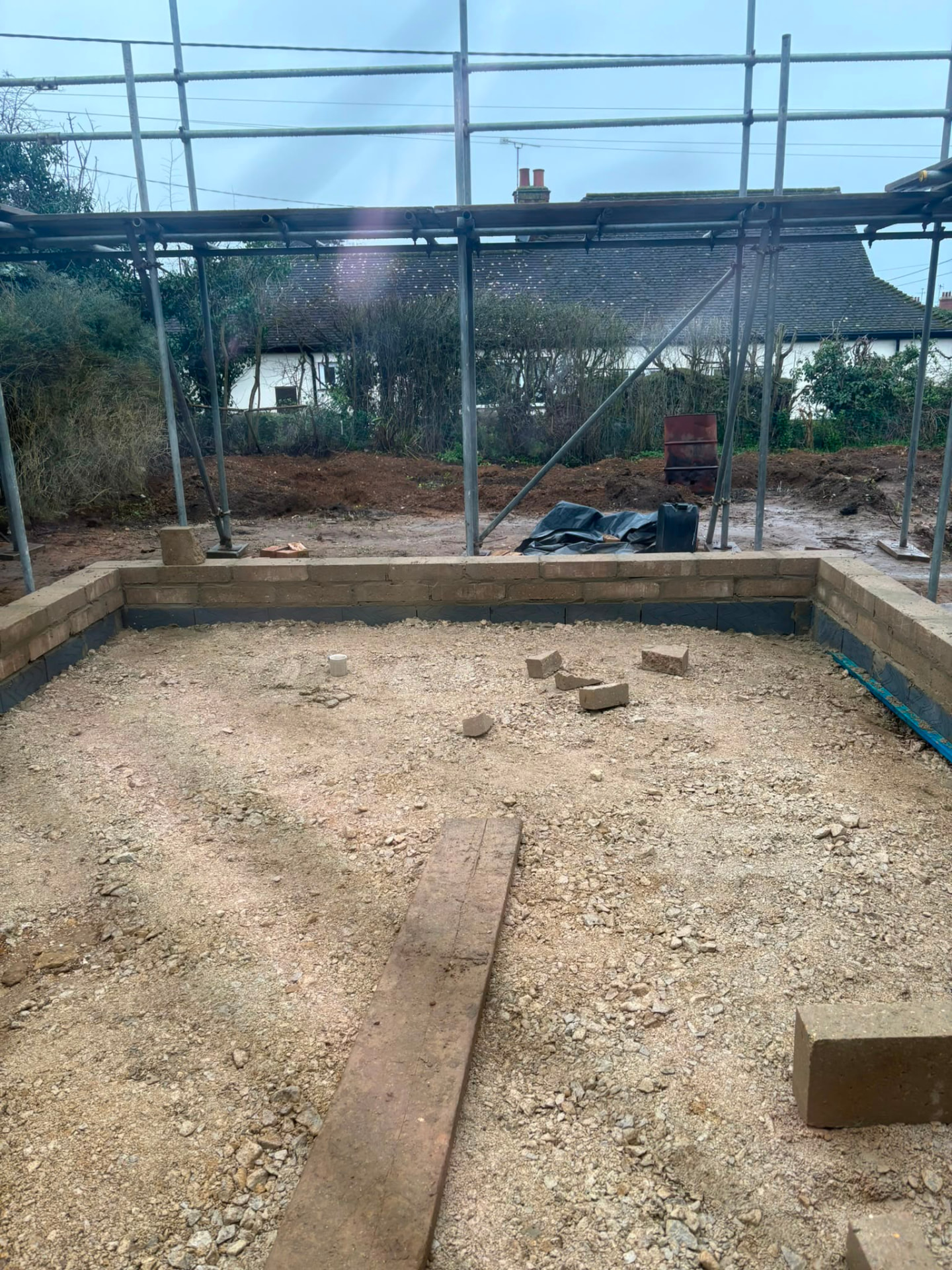 Extension footings and brickwork with scaffolding in place